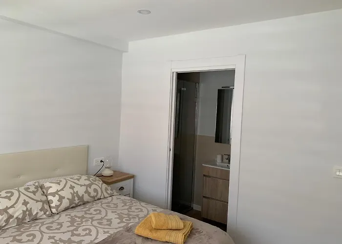 Urbanizacion Con Piscina Arnelas *